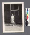 One woman #57 [building in background] by Richard Shizuo Yoshikawa