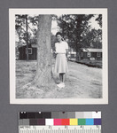 One woman #58 [next to tree] by Richard Shizuo Yoshikawa