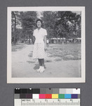 One woman #6 [on path; camp in background]: Grace Kagawa by Richard Shizuo Yoshikawa