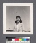 One woman #61 [smiling, camp in background] by Richard Shizuo Yoshikawa