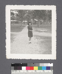 One woman #73 [on path; camp in background; same person as #53] by Richard Shizuo Yoshikawa