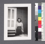 One woman #79 [standing in front of porch] by Richard Shizuo Yoshikawa