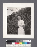 One woman #86 [in front of ivy-covered wall]: Bessie Humita Ouye by Richard Shizuo Yoshikawa