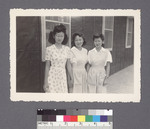 Three women in front of building by Richard Shizuo Yoshikawa