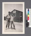 Two men #5 [in front of building] Tom Kitacawa by Richard Shizuo Yoshikawa