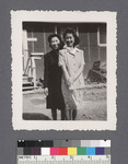 Two women #5 [in front of building]: Kay Usui (L), Jeane Ishida (R) by Richard Shizuo Yoshikawa