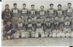 Football: boys in uniform in 2 rows #1: Top row L-R Bruno Kitagawa-Head Coach, Fred Sato (88), Henry Oga (20), Henry Hirata (21), Nobie Tanimoto (98), Sam Shimizu (36), Tetsuo Hayashi (76), Frank Sato (40). Bottom row L-R Harry Oshima-Reporter-Rohwer Outpost, John Muraoka (29), Manabu Nagata (45), Joe Mikami (25), Fred Kurata (13), Wimpy Tanabe (17), Richard Tanaka (43) by Richard Shizuo Yoshikawa